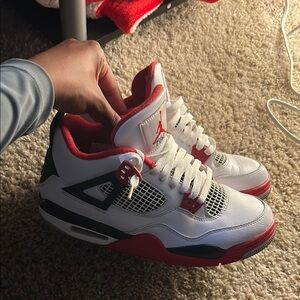 Fire Red Jordan 4s (GS) Size 7Y (or women’s 8.5).